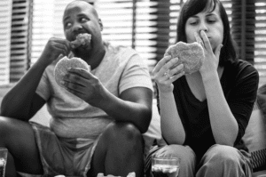 eating burgers and chicken